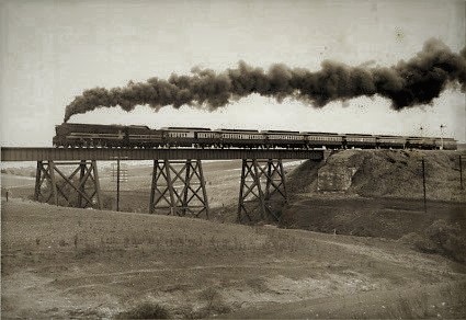 Hamley Bridge A black and white photograph of a train crossing Hamley Bridge.